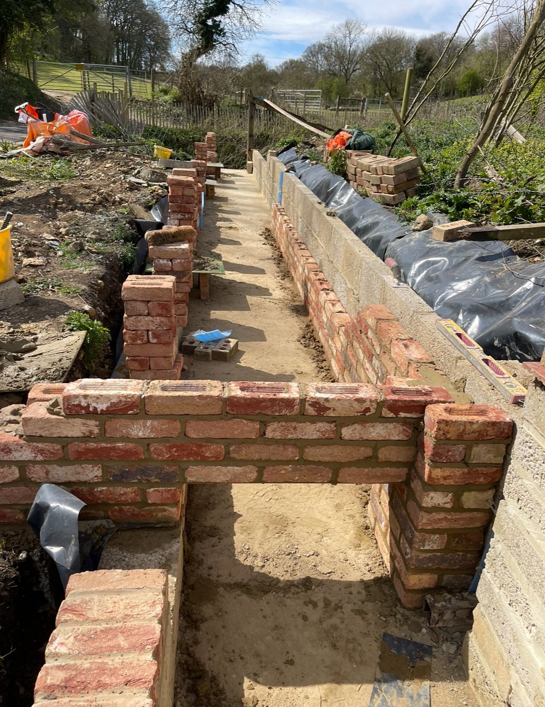 Boundary wall foundations in a rural countryside setting
