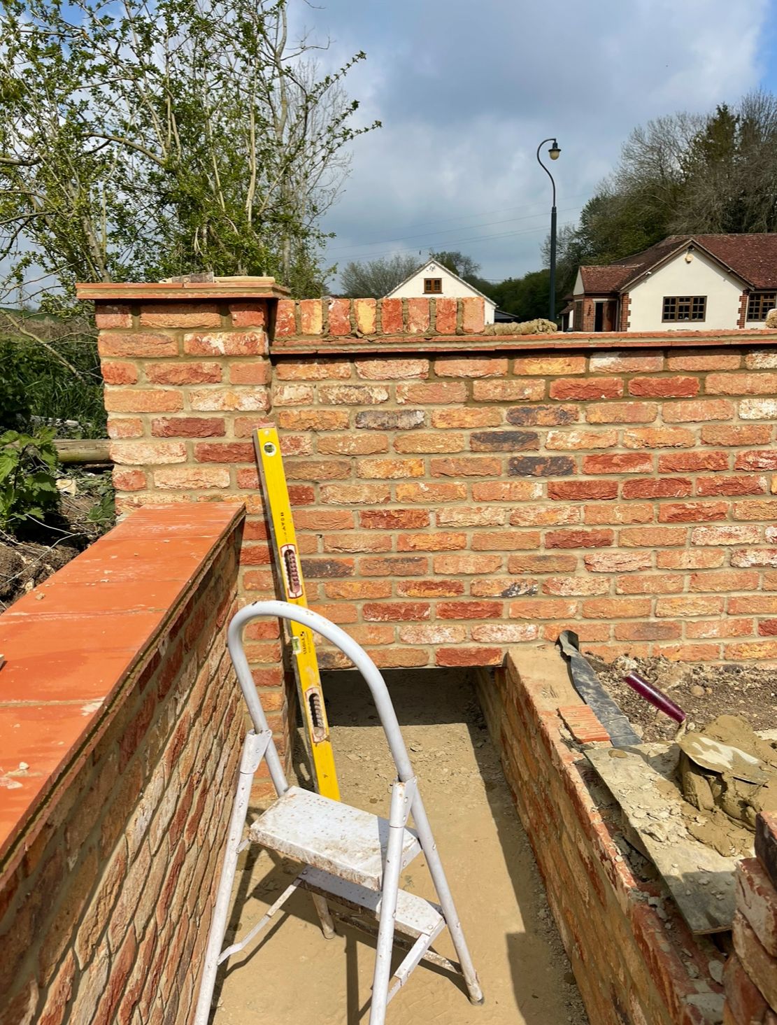 Brick pier and coping detail on boundary wall
