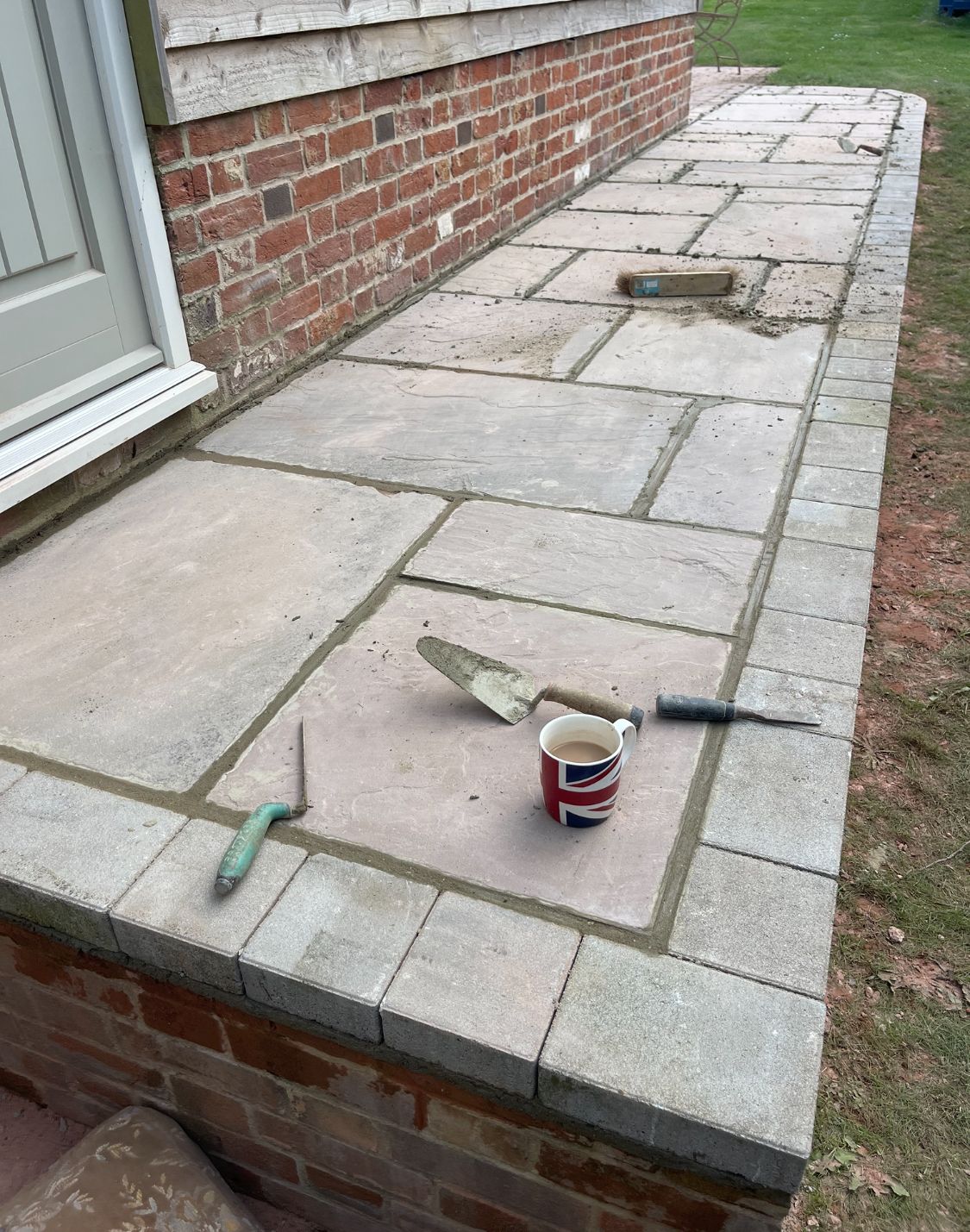 Brick boundary wall with piers front view
