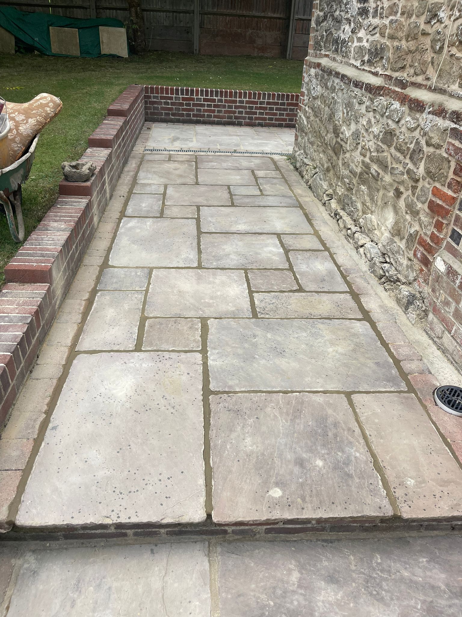 Natural stone patio with decorative circle feature