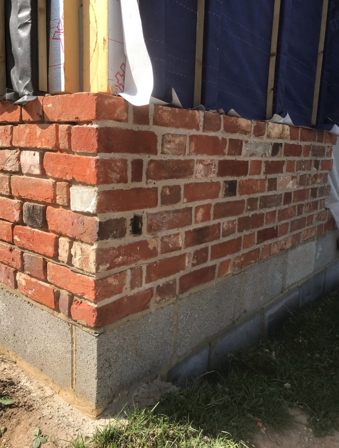 Reclaimed brick corner bond close-up detail
