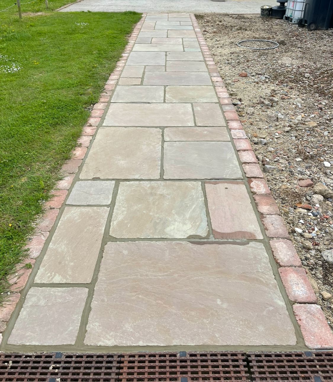 Sandstone path with brick edging