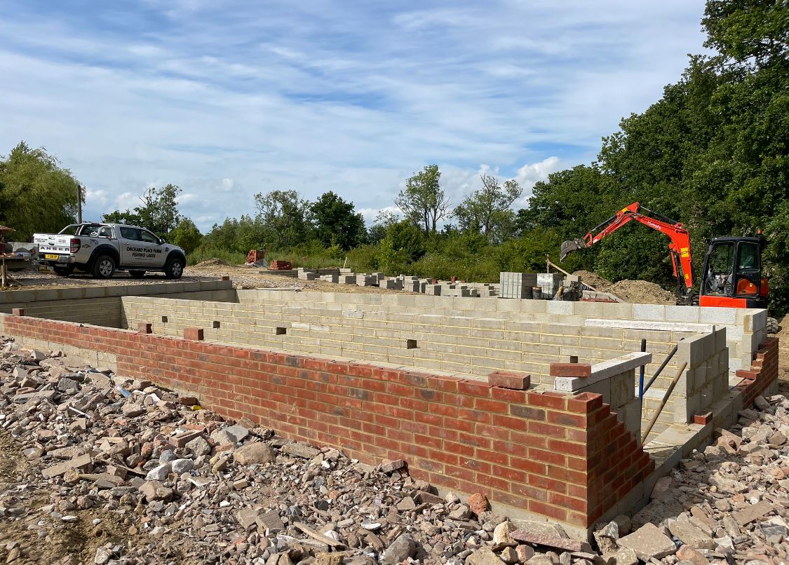 Stone patio with brick edging at a cottage